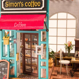 Caffetteria in miniatura con luci e pianoforte – Immagine 2